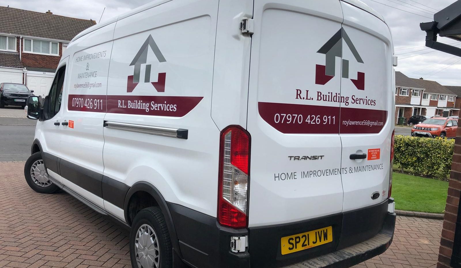 Ford Transit vehicle livery in silver grey & maroon vinyl.